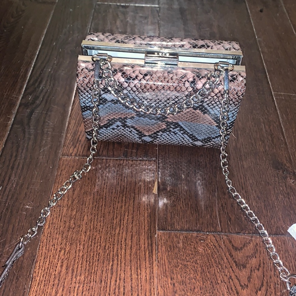 Small used BCBG boxed cross body.